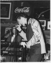 Autographed photo of Willy DeVille,1990