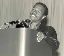 Unidentified African American at podium, 1987
