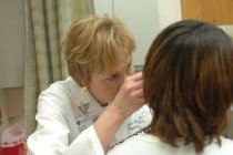 Justine Strand with patient, 2005