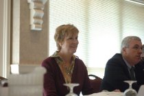 Justine Strand in meeting, 2005