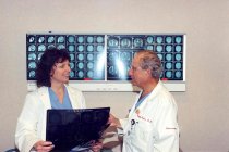 Magdy Boulos and Teresa Kitko reviewing X-rays, 2004