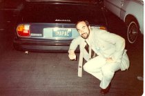 Dave Mittman posing with "IMAPAC" vanity plate