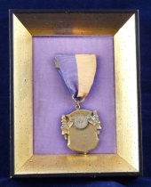 Emory alumnus medal with frame
