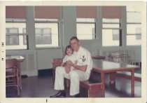 WIlliam H. Feyh with pediatric patient