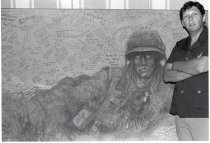 George Skypeck in front of God Loves a Grunt