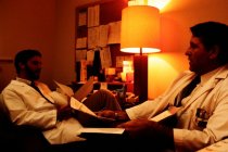 AAPA Promotional Photos - Mike Benjamin in Conversation with Resident Physician, undated