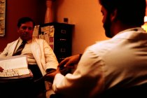 AAPA Promotional Photos - Man Pointing at Model, undated