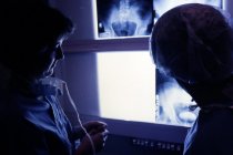 AAPA Promotional Photos - Two People in Front of X-rays, undated