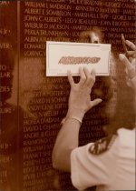 Member of Veterans Caucus Takes Rubbing at Vietnam Memorial, 1989