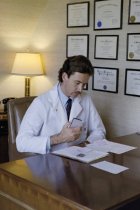 Paul Hendrix at his Desk in his Office at Duke University (1), 1987