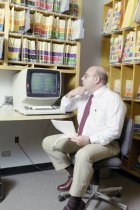 Victor Germino at Desk Studying Computer, 1987