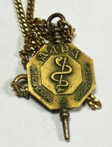 Gold AAPA Logo Pendant and Necklace