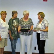 Library Board President Presents Certificate of Appreciation