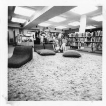 Child reading on the floor