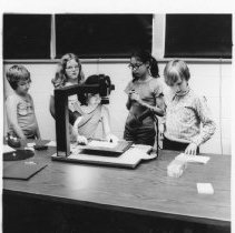 Children take turns making films