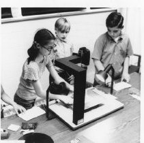 Children gather around to make films
