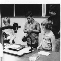 Sister Rita Ann Bert and children learn filmmaking