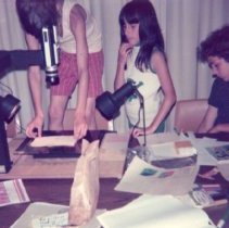 Children take turns using machine