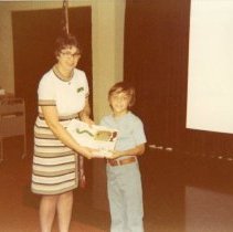 Les Miller and Rita Ann Bert smile at camera