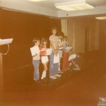 Children posing with awards