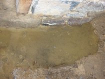 Restored DeTurk exterior pier foundation north of kitchen doorway