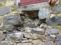 #2 - 1621:Displaced wall wythe partly removed under 2d floor window