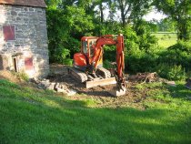 0001-- Excavator to move earth, & set bed-stones, step-blocks, and risers