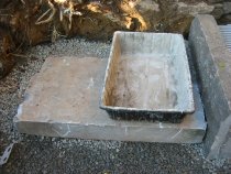 0009: Limestone bed-stones supported on bedrock.