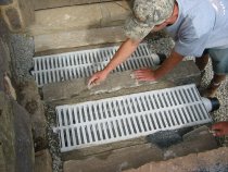 0063--: Troweling mortar into joints flanking CD2