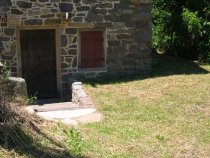 104: East eaves wall detail and kitchen doorway, staircase & walls complete