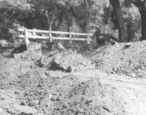Morlatton village, removing access ramp to covered bridge (1970)