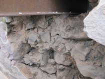 [#2863, 4/7/11]: Disintegrated mortar residue in wall core