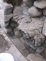 [#2882, 4/7/11]: Dismantled exterior wall w/ small stone agregate in mortar