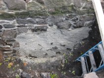 [#1158, 10/7/10]: Scratch-coat pargeting on W segment of N gable foundation