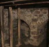 smaller vault under exterior kitchen door-passage