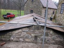 #8, 6944- Restored end-wall of Keim root cellar, grilled vent, and temp. ro