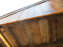 Image #24, 5549: Floor boards and gable of roof-extension hood in store-yar