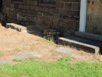 #6, 9946: Reconstructed Douglass House cellar vent-window well