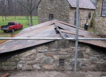 #12, photo 6944: temporary plywood roof over restored vault