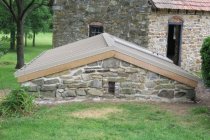 #15, photo 16: Root cellar vault with new metal roof-shelter