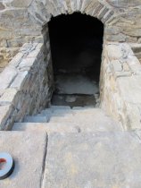 Image #13, 5334: reconstructed cellar steps and original arched doorway