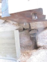 #1, 8427: Steel anchor pins protruding from oak door jambs