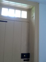 #2, Detail of paneled door surround and lined door, Isaac Potts House