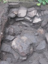 #8, 8/9/13, 775: rubble stone adjacent to masoned foundation base