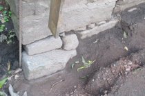 Image #1: failed foundation plinth at NW corner, below grade