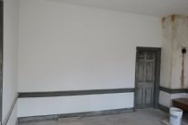 #2: New and un-restored plaster in front/store room