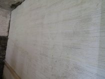 #1: Plaster scratch coat keyed into partition lath in kitchen