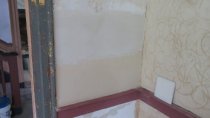 Image #7: sample finish plaster patches (left of corner),chamber walls