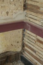 Image #1: chipped "keys" in base plaster; replaced lath and chair rail