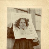 Bertha Brechet with newspaper